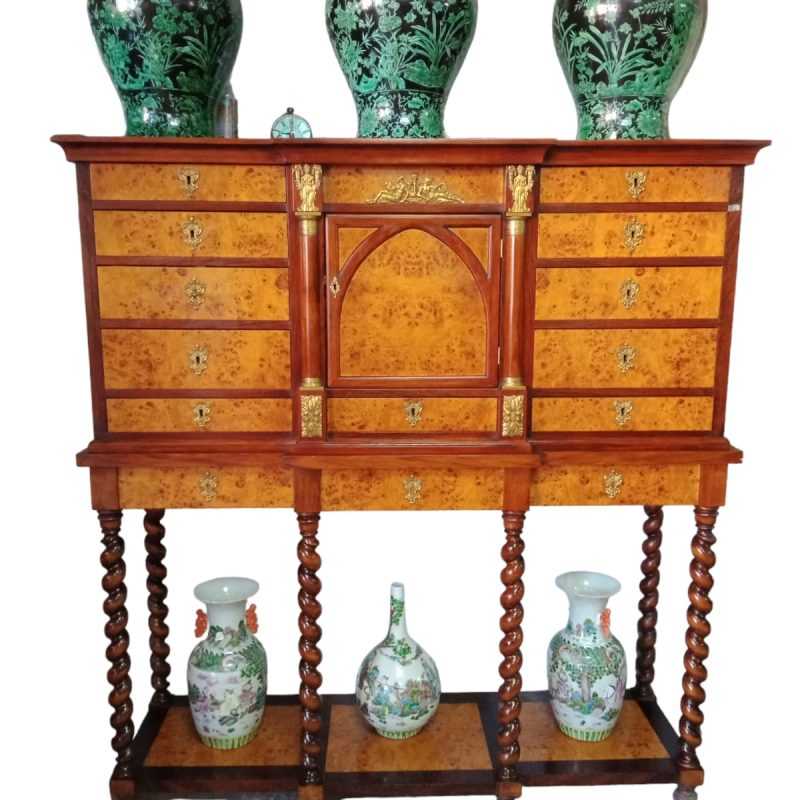 The Louis XIV commode is a piece of furniture that embodies the opulence and grandeur of the Louis XIV style, which was prominent during the reign of King Louis XIV of France in the 17th century. This commode is characterized by its lavish design, meticulous craftsmanship, and intricate ornamentation, reflecting the aesthetic tastes of the Baroque period.