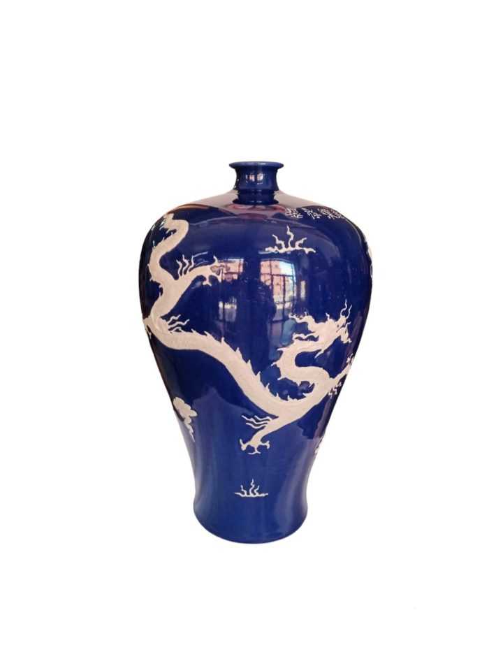 Modern chinese ceramic vase blue with a white dragon