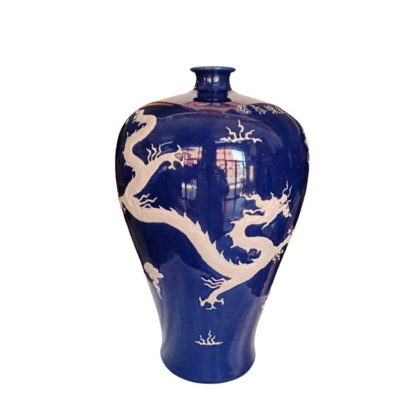 Modern chinese ceramic vase blue with a white dragon