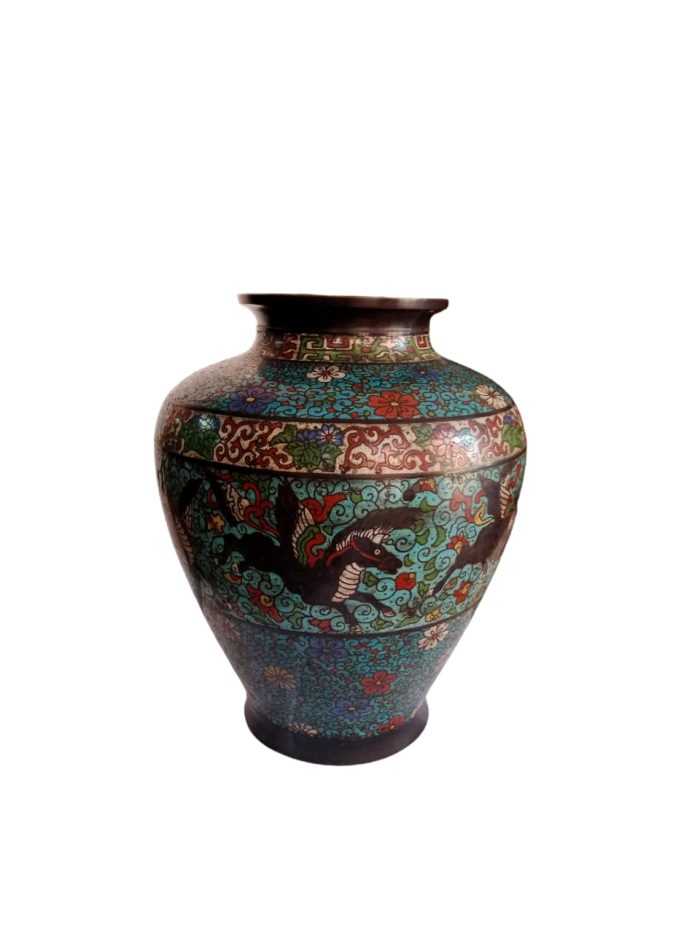 In summary, an antique black dragon cloisonné bronze vase is a fusion of artistic techniques and cultural symbolism. The combination of bronze, cloisonné, and the dragon motif creates a visually stunning and culturally significant piece that not only serves as a decorative item but also as a window into the artistry and traditions of the past