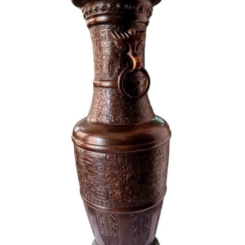 an early 19th-century bronze vase encapsulates a fascinating blend of art, history, and craftsmanship. Its material, design, patina, and contextual significance contribute to its value as both a functional object and a cultural artifact from a bygone era.